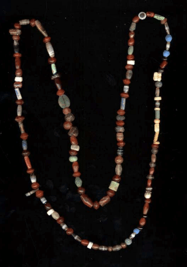 A photo of a multicoloured beaded necklage in all shapes and sizes