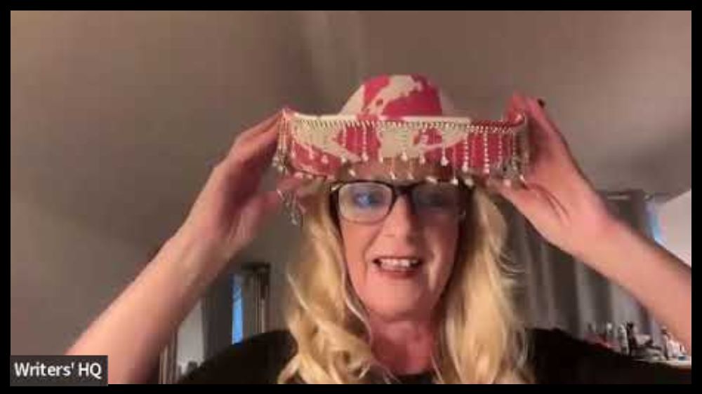 Flashy Kathy donning her best pink, fringed Dolly Parton hat to pay homage to the dear departed legend herself