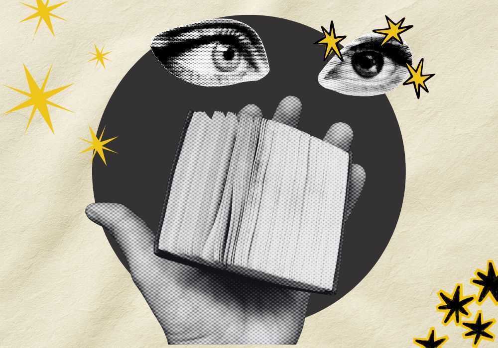 A punky image with a hand holding a tiny book and two black and white eyes surrounded by stars looking at it